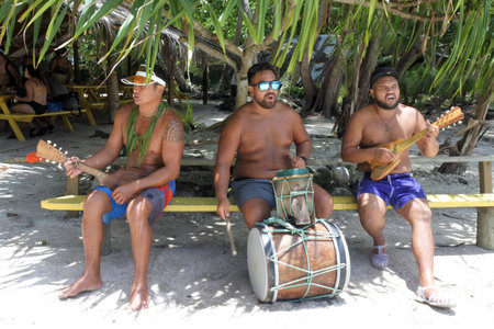 RAROTONGA - DEC 21 2017:Pacific Island men play music.Music in the Cook Islands is varied, with Christian songs being popular, but traditional dancing and songs in Polynesian languages remain popular.のeditorial素材