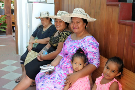 RAROTONGA - DEC 18 2017:Cook Islanders women pray at CICC church.94% of Cook Islanders (14,974) associated themselves with a faith.The Cook Islands Christian Church dominant with 49% (7,356) members.のeditorial素材