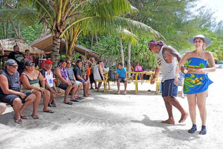 RAROTONGA - DEC 21 2017:Tourists enjoying cultural show on Koromiri Island in Rarotonga Cook Islands. About 100,000 visitors travelling to the islands each year, tourism is the country's main industryのeditorial素材