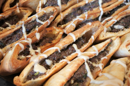 Shawarma in pita bread served on a party table. Falafel is a traditional Middle Eastern food.の写真素材