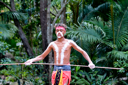 Young adult Indigenous Australianman holding a spear in Queensland, Australia.