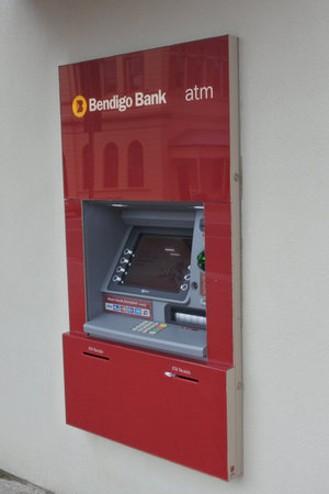 Queenstown, Tasmania - March 27, 2019: Bendigo and Adelaide Bank automated teller machine (ATM). The bank was formed by the merger of Bendigo Bank and Adelaide Bank in November 2007.のeditorial素材
