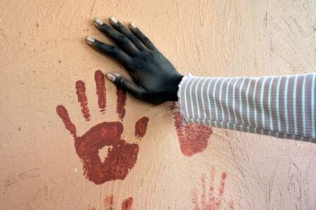 Indigenous Australian woman handprint on a wall.の写真素材