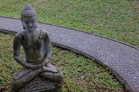 Buddha statue sculpture in Bali Indonesia. Buddha statue sculpture in Bali Indonesia. Buddha was a monk, mendicant, sage, philosopher, teacher and religious leader on whose teachings Buddhism was founded.の写真素材