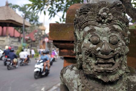 Traffic on the main road of Ubud town a very important culture center and popular tourist travel destination in Bali Indonesia.の写真素材