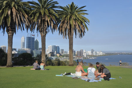 PERTH, WA - NOV 06 2019: Visitors at Kings Park and Botanic Garden overlooking Perth city downtown skyline.Kings Park is one of the world's largest and most beautiful inner city parks.のeditorial素材