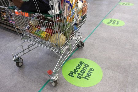 PERTH - MAR 31 2020:Social distancing marks on supermarket floor intended to stop spread of the contagious Coronavirus.Since COVID-19 outbreak started 786,228 got infected and 37,820 die worldwide.のeditorial素材