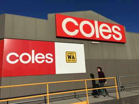 Australian woman going shopping at Coles supermarket.