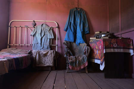 Remains of an old bedroom in abandoned house in Gwalia ghost town in Western Australia.の写真素材