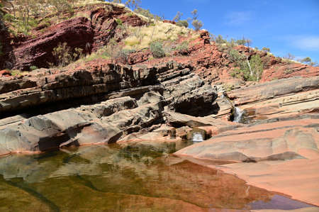 Landscape view of fresh water flowing in Hamersley Gorge at Karijini National Park Pilbara region in Western Australiaの写真素材