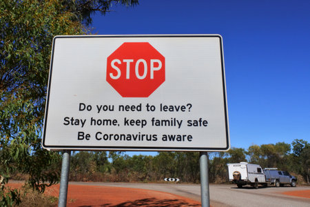 BROOME, WA - JULY 07 2022:Be Coronavirus aware stop traffic sign.As of 3 August 2022, Australia had administered 62,492,656 vaccine doses across the country.のeditorial素材