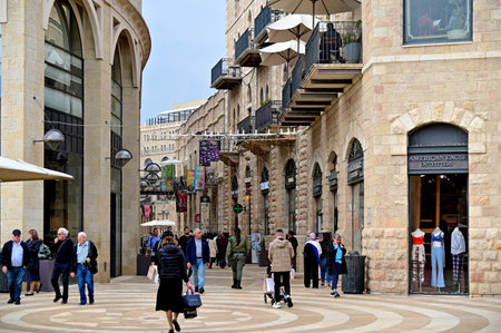 JERUSALEM - NOV 15 2022:Padestrians at Alrov Mamilla Avenue in Jerusalem Israel. It is the only open-air shopping mall in Israel.のeditorial素材