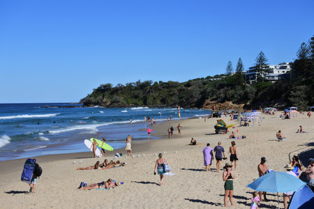 COOLUM BEACH, QLD - APR 13 2023:Aerial landscape view of many tourists on Coolum beach a very popular tourist destination for holidaymakers in Queensland, Australia.のeditorial素材