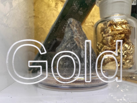 Gold sign in front of natural deposits of Gold.