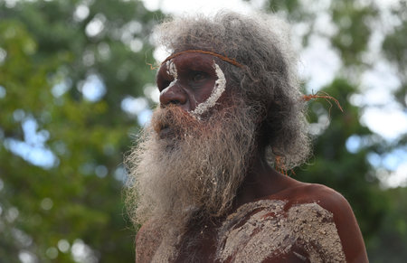 LAURA,QLD - JULY 08 2023:Active senior Indigenous Australians man on ceremonial dance in Laura Quinkan Dance Festival Cape York Australia. Ceremonies combine dance, song, rituals, body decorations and costumesのeditorial素材