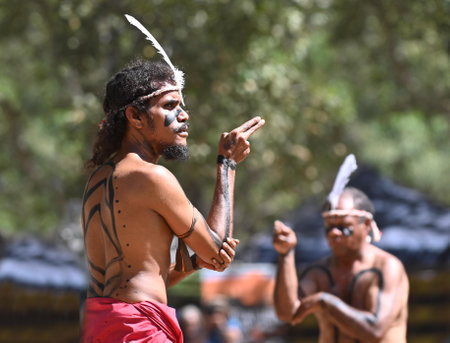 LAURA,QLD - JULY 08 2023:Indigenous Australians men on ceremonial dance in Laura Quinkan Dance Festival Cape York Australia. Ceremonies combine dance, song, rituals, body decorations and costumesのeditorial素材