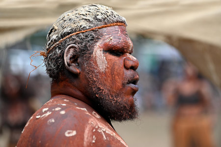 LAURA,QLD - JULY 08 2023:Indigenous Australians man on ceremonial dance in Laura Quinkan Dance Festival Cape York Australia. Ceremonies combine dance, song, rituals, body decorations and costumesのeditorial素材