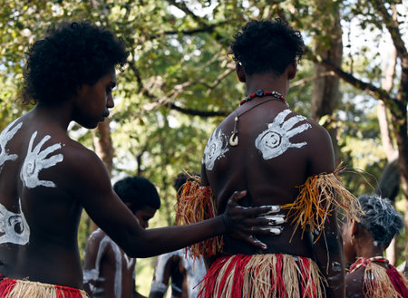 LAURA,QLD - JULY 08 2023:Indigenous Australians men on ceremonial dance in Laura Quinkan Dance Festival Cape York Australia. Ceremonies combine dance, song, rituals, body decorations and costumesのeditorial素材