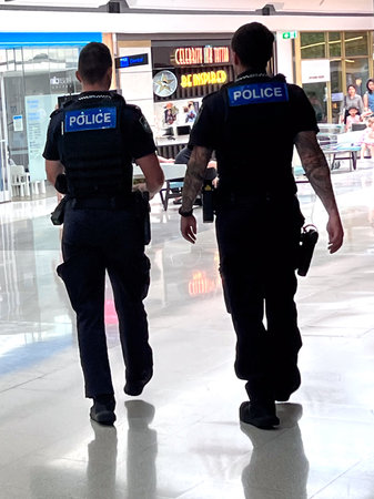 BRISBANE - FEB 4 2024:Queensland Police officers patrol in city street.In 2016 several human rights...