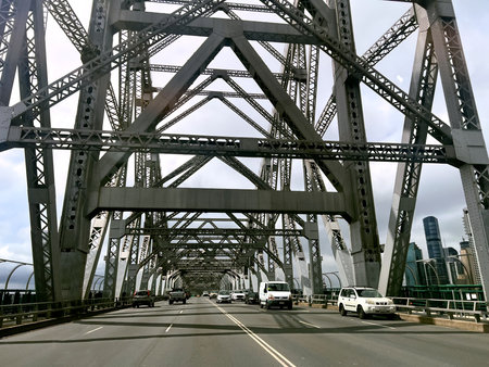 BRISBANE - DEC 15 2003:Traffic on Story Bridge Brisbane Queensland Australia.It's a heritage-listed steel cantilever bridge spanning Brisbane River carries an average of 97,000 vehicles each day.のeditorial素材