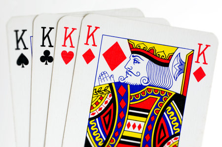 King cards isolated on white background.A standard deck of playing cards contains four kings: the King of Spades, King of Hearts, King of Diamonds, and King of Clubs.のeditorial素材