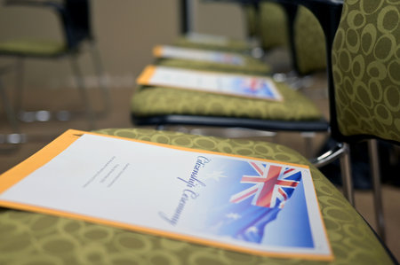 PORT MACQUARIE - NOV 28 2025:Australian citizenship ceremony, a formal event where new citizens make the Pledge of Commitment to Australia and receive their Citizenship Certificate.のeditorial素材
