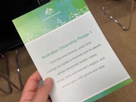 PORT MACQUARIE - NOV 28 2025:Australian citizenship pledge.In the 2024-25 financial year, 165,193 people became Australian citizens.のeditorial素材