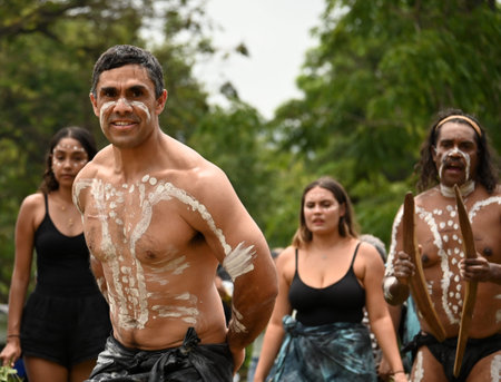 COFFS HARBOUR, NSW - JAN 26 2026:Indigenous Australians male and female dancing, a profound expression of culture, connecting women to Ancestors, Country, and community through movement, song, and storytelling. Performances, often featuring traditional, sのeditorial素材