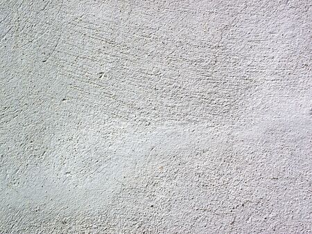 Rugged wall texture background shot on sunny dayの写真素材
