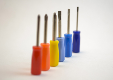 colorful isolated mini crewdriver bits lined upの写真素材