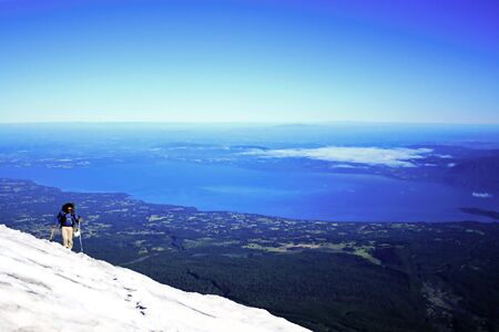 climbing up the Villarrica volcano in south Chileの写真素材