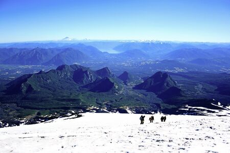 climbing up the Villarrica volcano in south Chileの写真素材