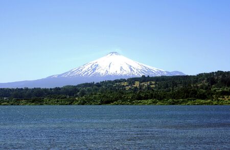 Villarrica vulcano covered in snowの写真素材