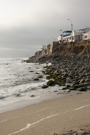 Houses along the coastline of Punta Hermosa, Peruの写真素材