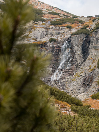 A natural waterfall by a hiking trail in the Tatras in Slovakia.の写真素材