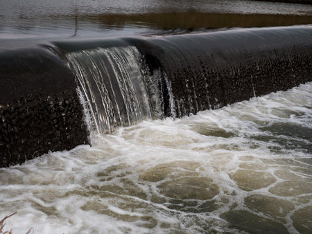 Part of a small waterfall on a river.の写真素材