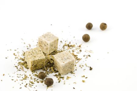 Pepper and stock cube herbs and spices arranged on a white backgroundの写真素材