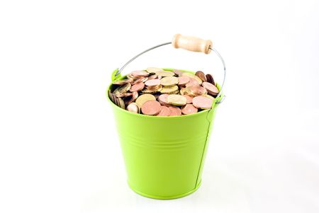 Euro coins in a green bucket isolated on white backgroundの写真素材