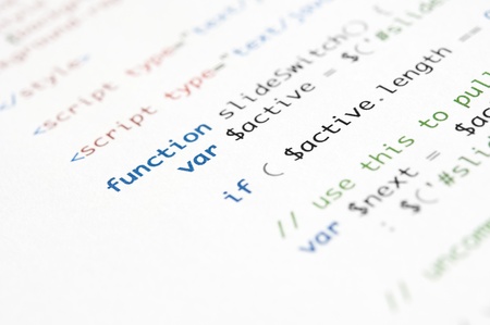 HTML script printed on white paper with shallow depth of fieldの写真素材