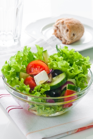 Closeup of Greek salad with feta cheese, cherry tomatoes and lettuceの写真素材