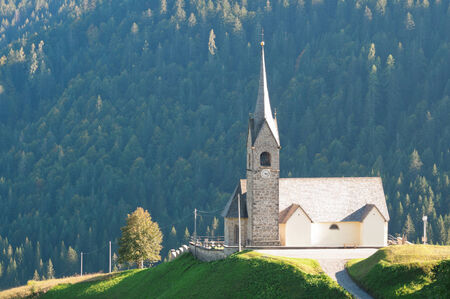 St. Lorenzo church in European Alps, Italyの写真素材