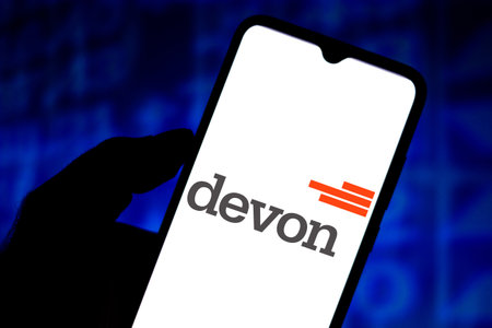 June 2, 2020, Brazil. In this photo illustration the Devon Energy Corporation logo seen displayed on a smartphone.のeditorial素材