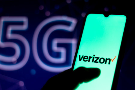 July 28, 2020, Brazil. In this photo illustration the Verizon Communications logo seen displayed on a smartphone. In the background the inscription 5Gのeditorial素材