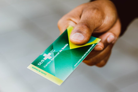 September 1, 2021, Brazil. In this photo illustration the man holds the Voter License. It is a document that proves that the person is able to vote in Brazil electionsのeditorial素材
