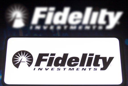 November 15, 2021, Brazil. In this photo illustration a Vanguard Group logo displayed on a smartphone screen and in the backgroundのeditorial素材