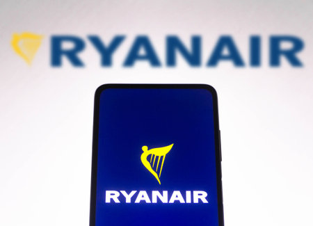 November 10, 2021, Brazil. In this photo illustration the Air China logo is displayed on a smartphone screen and in the backgroundのeditorial素材