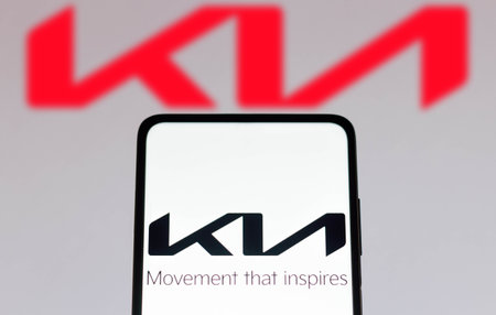 November 9, 2021, Brazil. In this photo illustration FIAT logo is seen on a smartphone screen and in the backgroundのeditorial素材