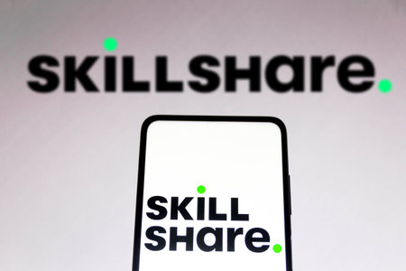 November 1, 2021, Brazil. In this photo illustration the Coursera logo displayed on a smartphone and on the backgroundのeditorial素材