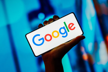 October 23, 2023, Brazil. In this photo illustration, the Google logo is displayed on a smartphone screenのeditorial素材