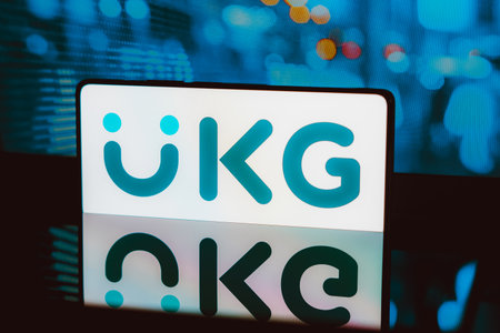 November 21, 2023, Brazil. In this photo illustration, the UKG logo is displayed on a smartphone screenのeditorial素材